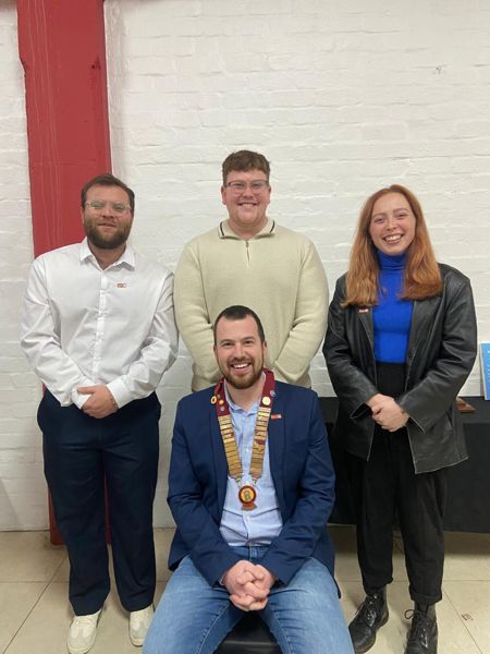 Our new president with members of the club at the 2026 induction.